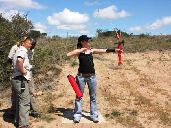 Christine Mischker - taking bow & arrow lessons